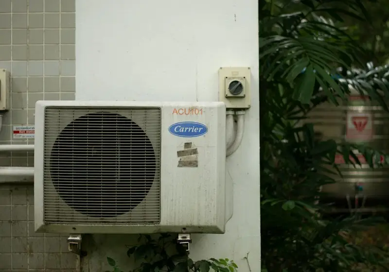 HVAC technician servicing equipment